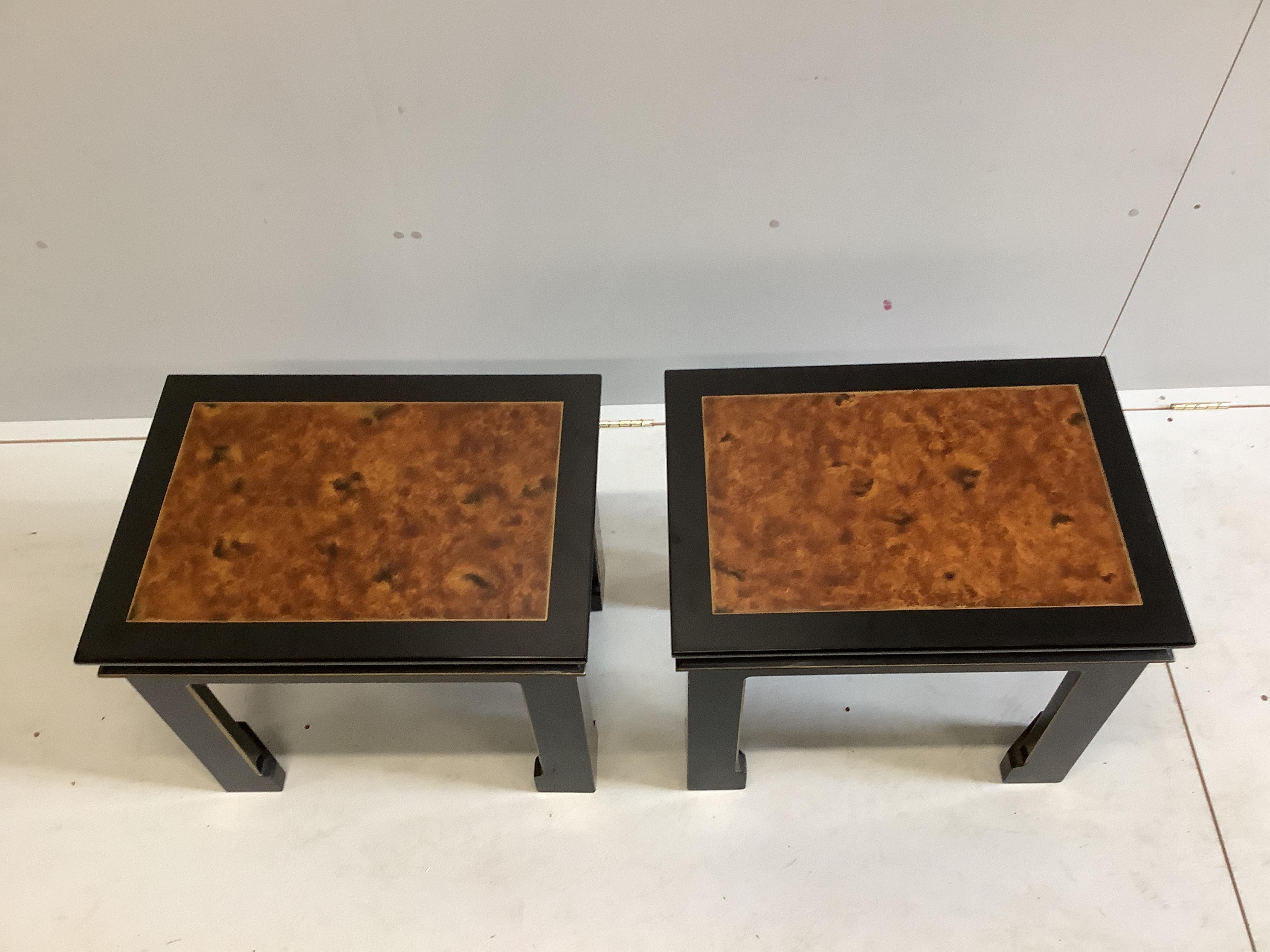 A pair of rectangular Chinese ebonised occasional tables, width 45cm, depth 61cm, height 50cm. Condition - good